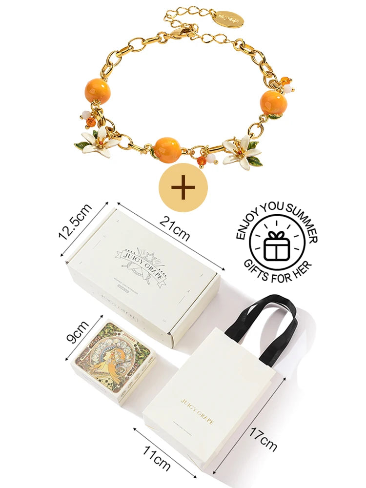 Aretes Colgantes Juicy baño de oro 18k, Naranja y Gardenia - Accesorios Frutales