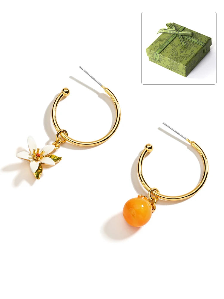 Aretes Colgantes Juicy baño de oro 18k, Naranja y Gardenia - Accesorios Frutales